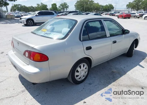 2002 Toyota Corolla Ce z USA, uszkodzony, nr VIN 1NXBR12E12Z601485